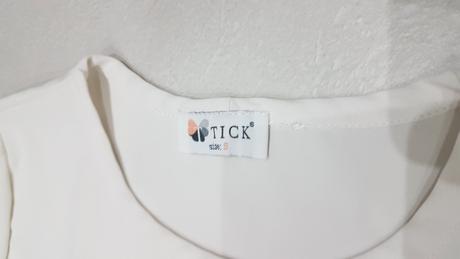 Krémová blúzka do pása s zaujímavý lem, s