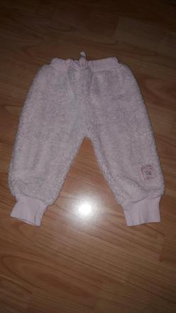 Teplucke nohavice, 62