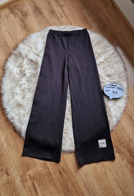 Široké vrubkove nohavice, 164