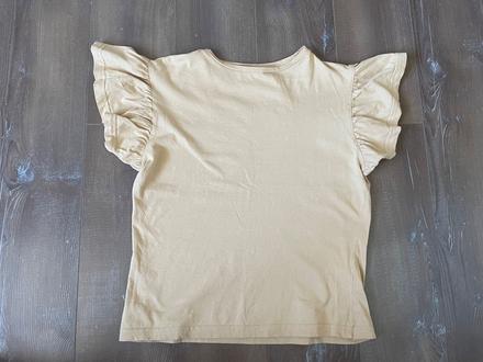 Béžové tricko, 36