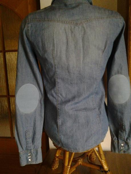 Riflova kosela so zaplatami na rukavoch , s