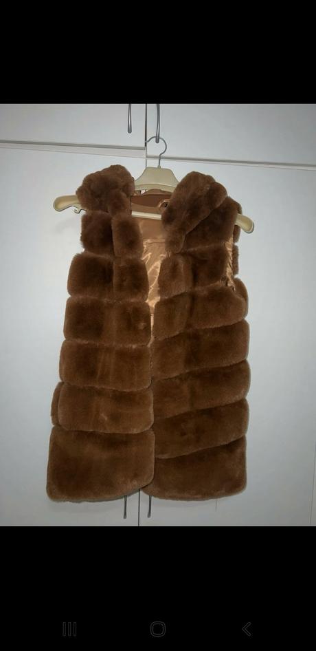 Kožušinova vesta, m