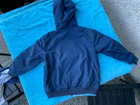 Obojstranná vetrovka, 104