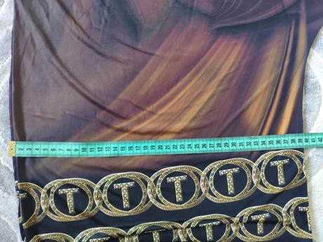 Asymetrická tunika b, m