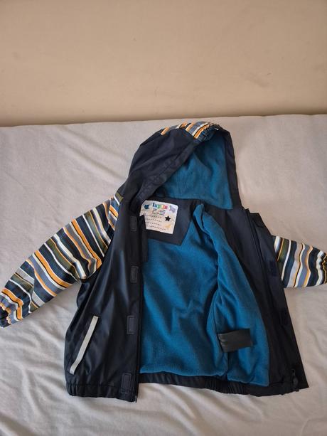 Bunda do dažďa, lupilu,86