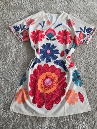 Šaty,