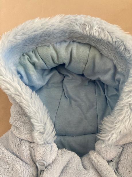 Teply zimny overal, 62