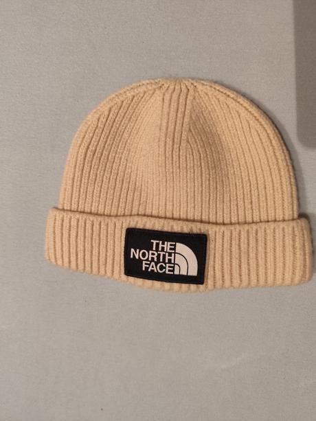 Krémová zimná čiapka the north face,pre veľ.s/m, s