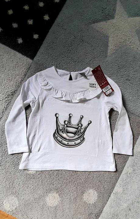 Nové tričko s korunkou, 104
