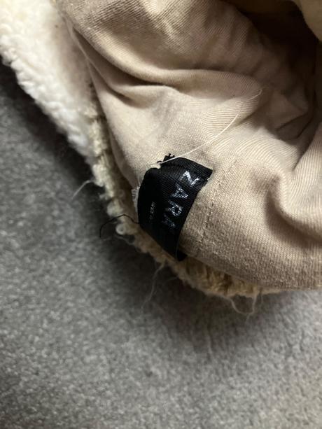 Nakrcnik s ciapkou zimny, zara