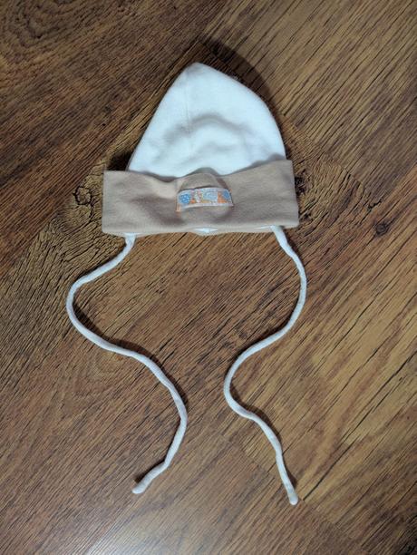 Prechodná čiapka, 62