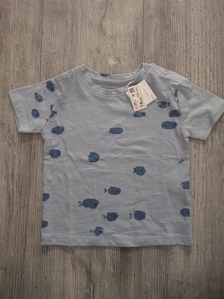 Tričká s visačkami, 74