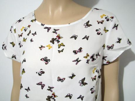Biely top s motýlikmi, l