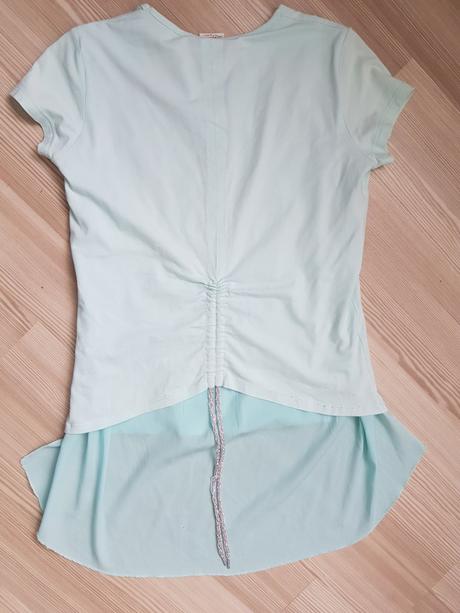 Malo nosena tunika, 164