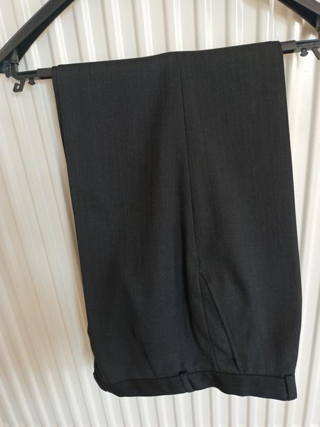 Nohavice s vestou, 158