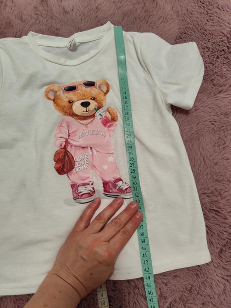 Medvedikove letné tričká, 122