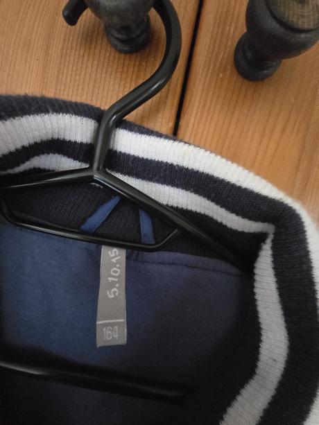 Prechodná bunda, 164