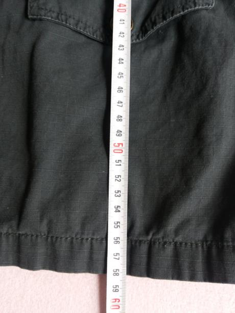 Tmavosiva bundicka yigga, 158