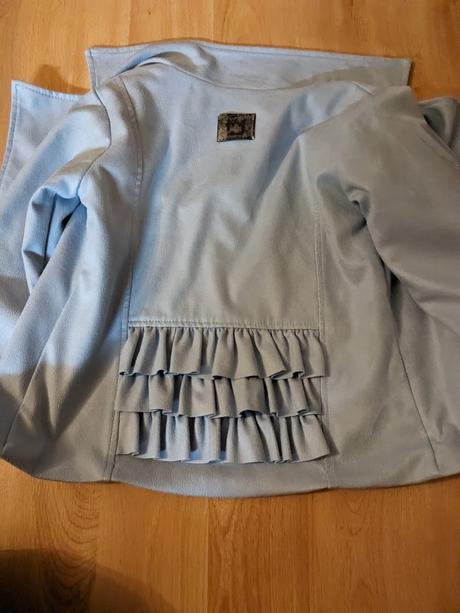 Motorkárska bunda, 128