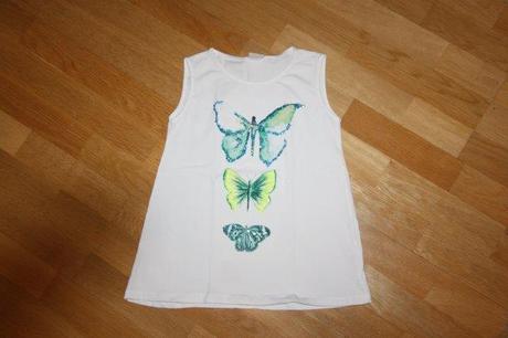 Tunika s motýlikmi, 140