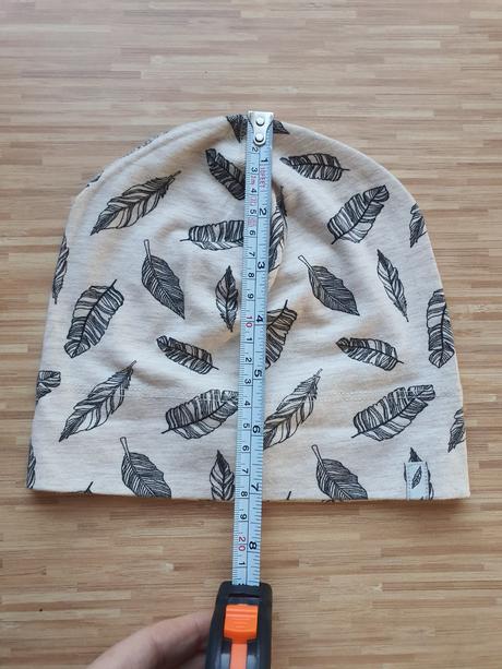 Dzerzejova ciapocka s pierkami 74-80, h&m,74