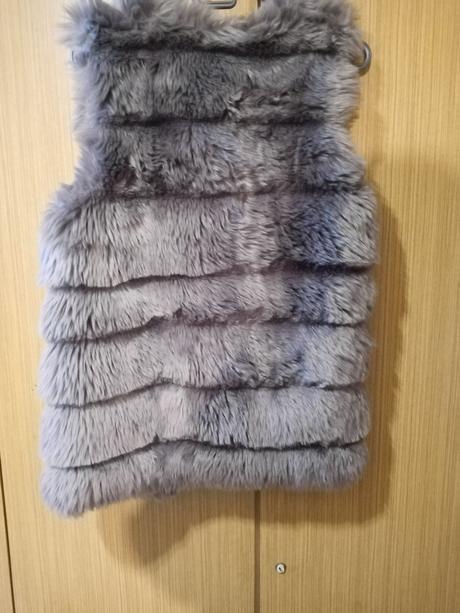 Dámska kozusinkova vesta, 