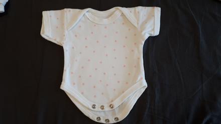 Body s ruzovymi bodkami, 50