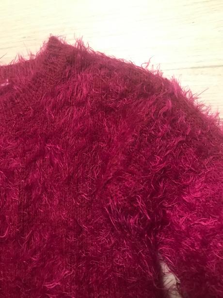 Chlpatý pulovrik, 122