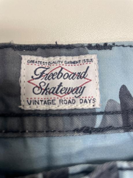 Chlapčenské maskáčové kraťasy., 152