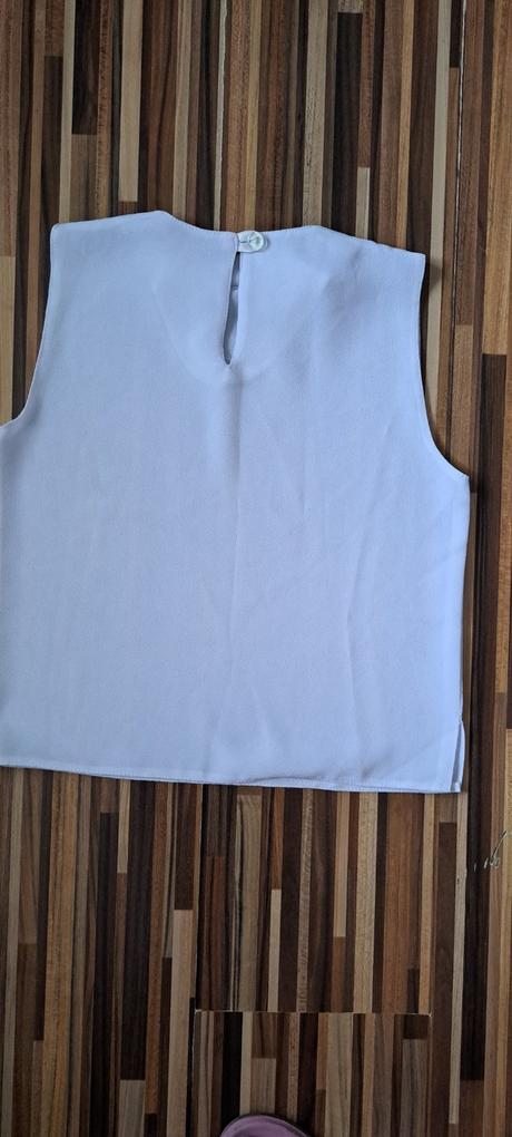 Biela bezrukávová blúzka, 140
