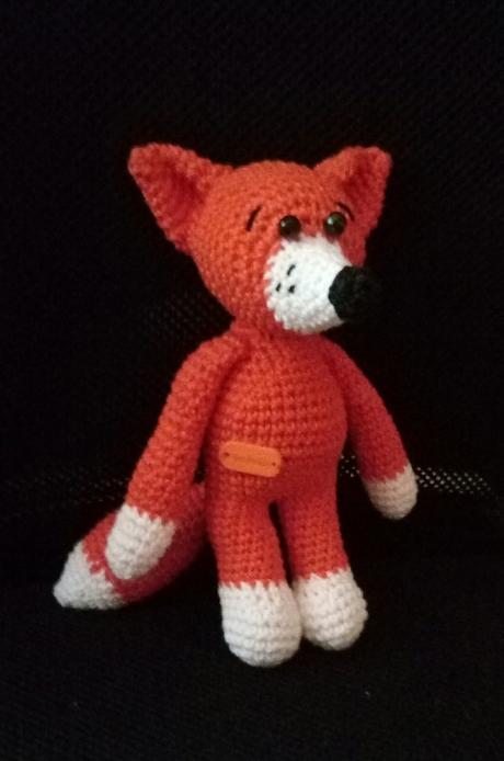 Háčkovaná líška, 