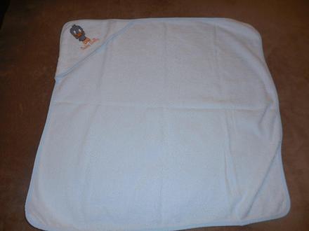 Bavlnená froté biela osuška s modrým lemom,