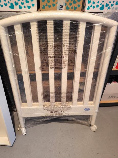 Drevena postielka na kolieskach 124x64, 