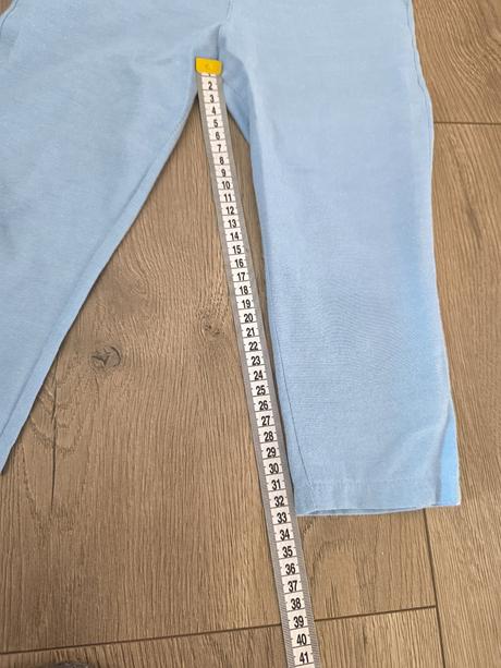 Nohavice s trakmi, 92