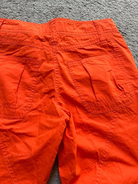 Nohavice oranžové, s