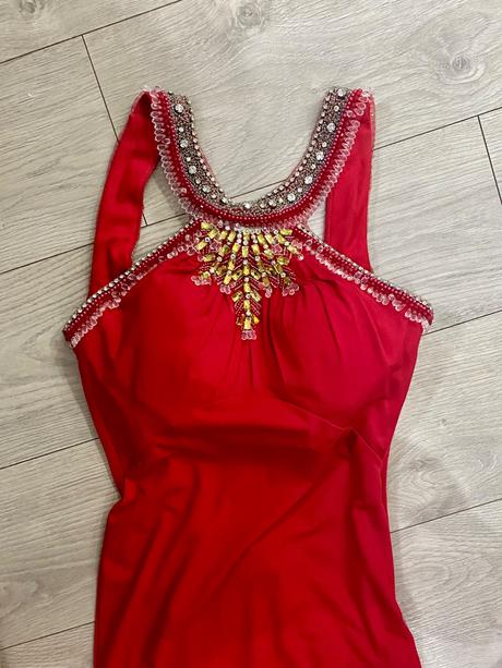 Vysoko elegantne saty od americkeho modneho navrha, s