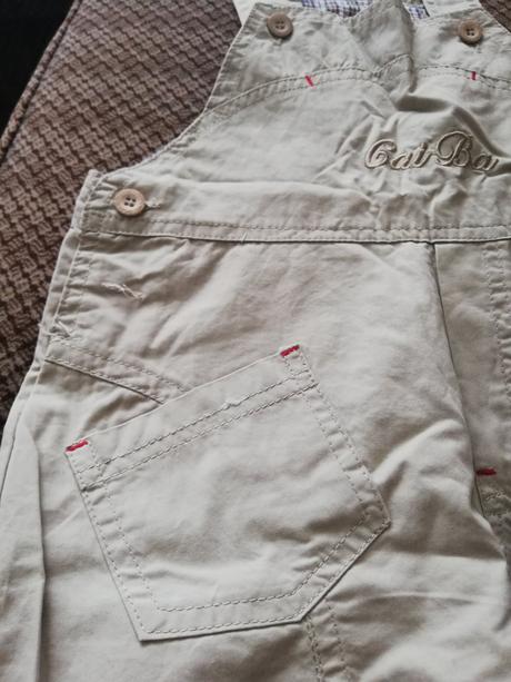 Nohavice s trakmi, 110