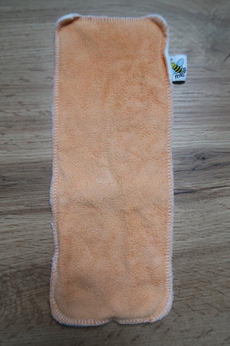 Krátká vkládací plena oranžová, majab