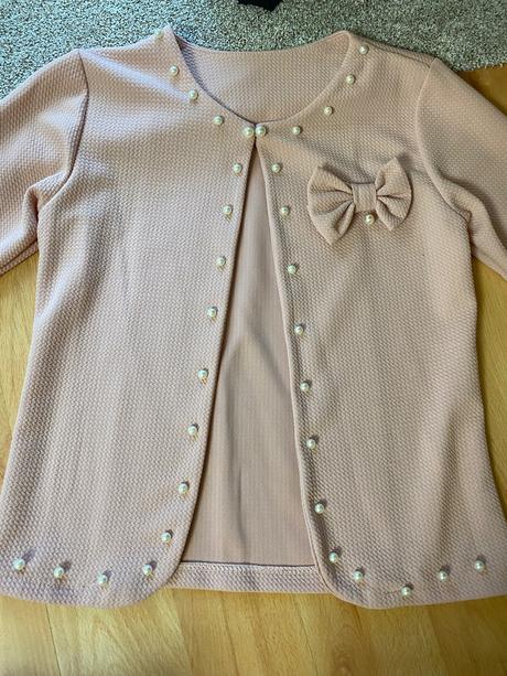 Slávnostný svetrík, 146