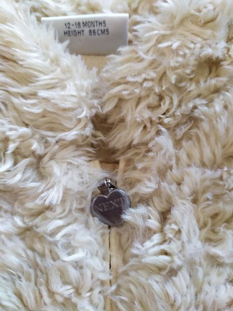 Teplá vestička next, next,86