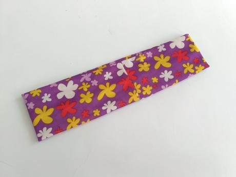 Kvetovaná čelenka do vlasov,