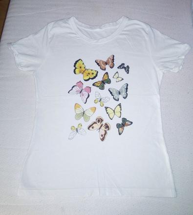 Biele tričko s motýľmi, 38