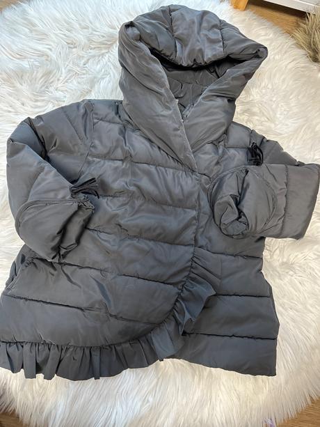 Prechodná  bunda s volanikmi, 110