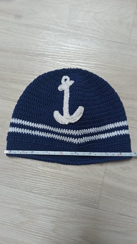 Čiapočka s kotvou, 104