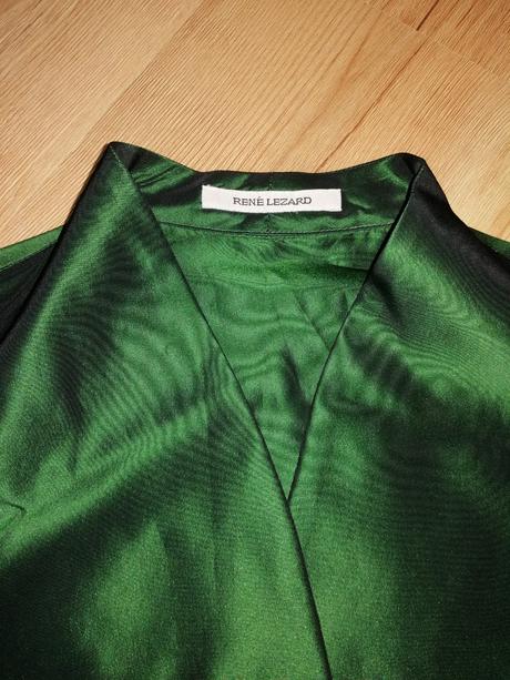 Smaragdové sako, 36