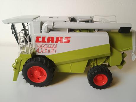 Kombajn claas so žacím zariadením,