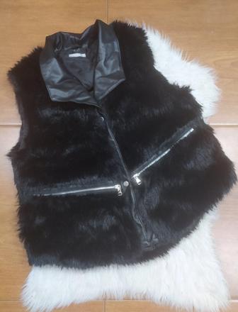 Kožušinova vesta, l