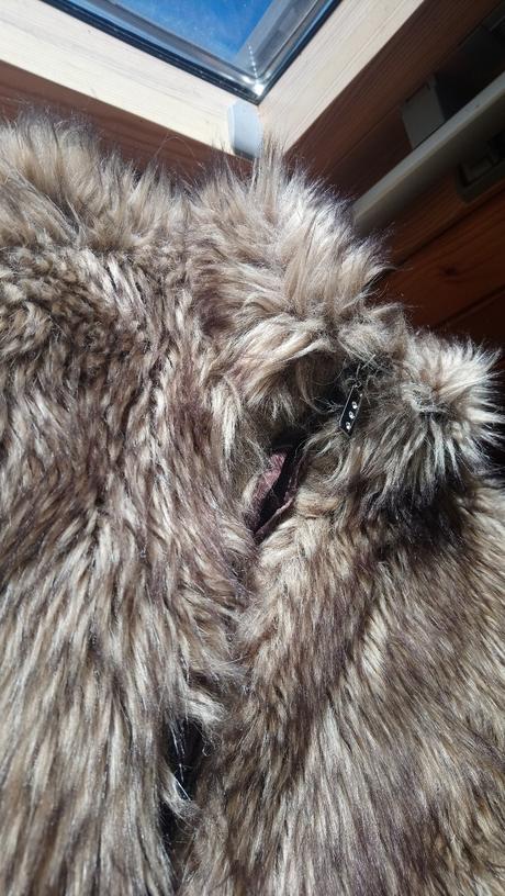 Kožúšková vesta, 164