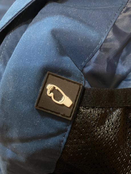 Nová nenosená vetrovka, l