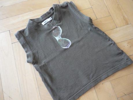 Tielko s okuliarmi, 92